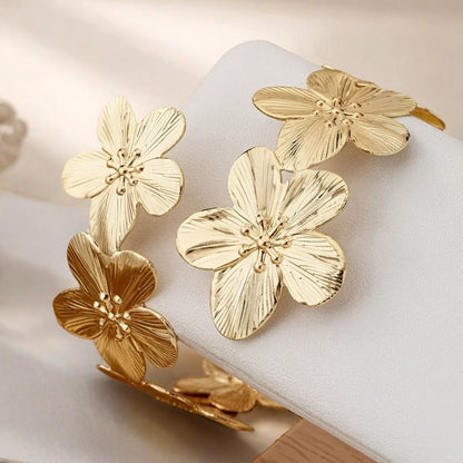 Elegant Golden Flowers Arm Cuff For Women Featuring Electroplated Metal Bangle Jewelry Accessory