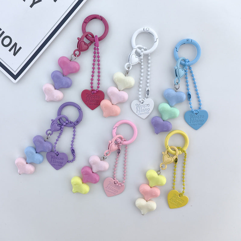 Heart Shape Keychain With Letter Pattern In Plastic Material, Available In White Color