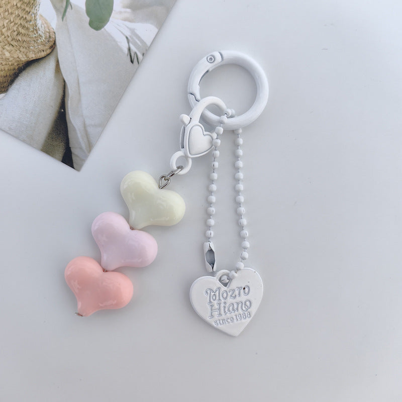 Heart Shape Keychain With Letter Pattern In Plastic Material, Available In White Color