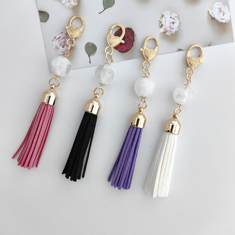 Tassel Bag Pendant In White Featuring PU Leather Material, Stylish Keychain Accessory