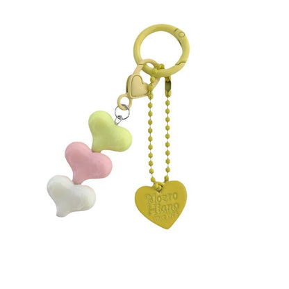 Heart Shape Keychain With Letter Pattern In Plastic Material, Available In White Color