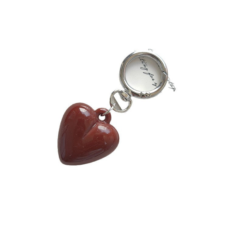 Heart Shape Keychain Made Of Durable Plastic In Classic Black, Perfect For Everyday Use And Gift Giving