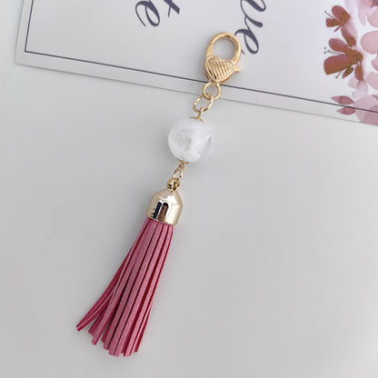 Tassel Bag Pendant In White Featuring PU Leather Material, Stylish Keychain Accessory