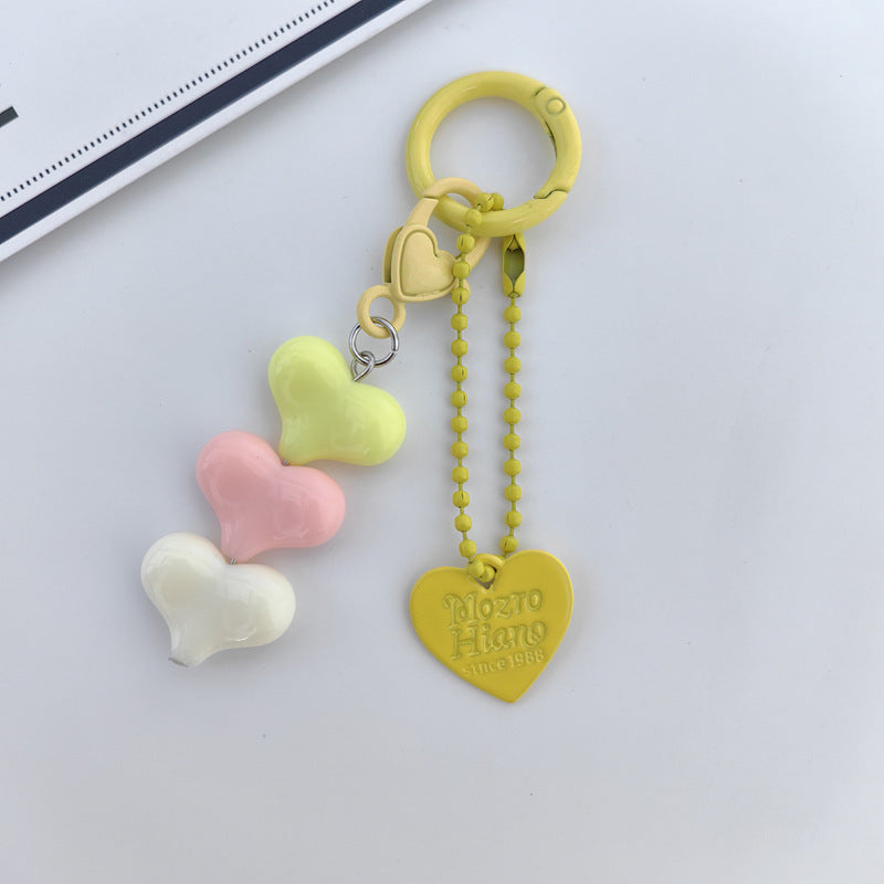 Heart Shape Keychain With Letter Pattern In Plastic Material, Available In White Color