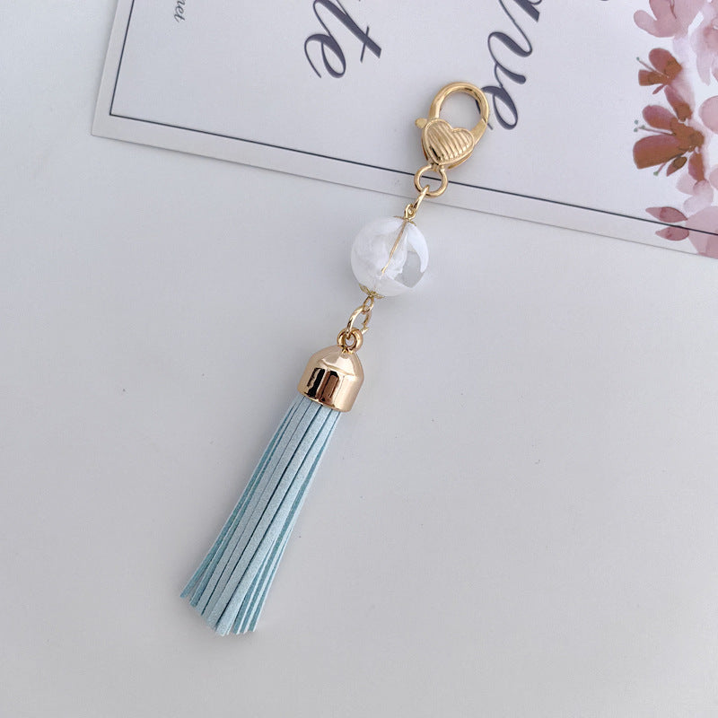 Tassel Bag Pendant In White Featuring PU Leather Material, Stylish Keychain Accessory