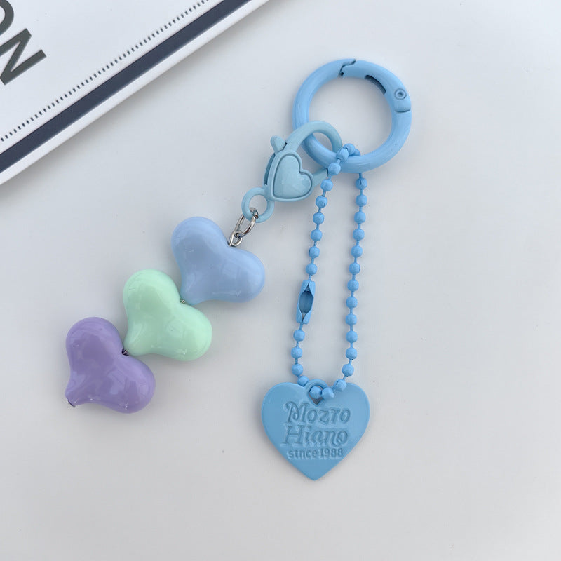Heart Shape Keychain With Letter Pattern In Plastic Material, Available In White Color