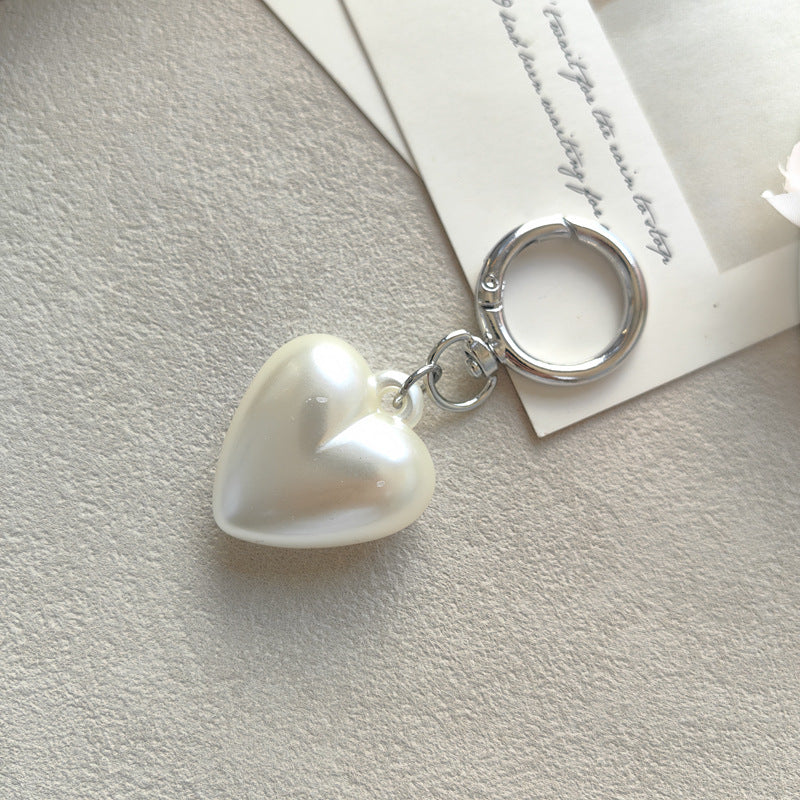 Heart Shape Keychain Made Of Durable Plastic In Classic Black, Perfect For Everyday Use And Gift Giving