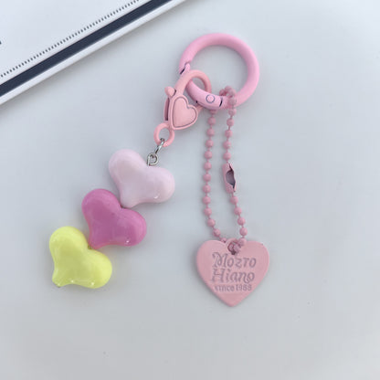 Heart Shape Keychain With Letter Pattern In Plastic Material, Available In White Color