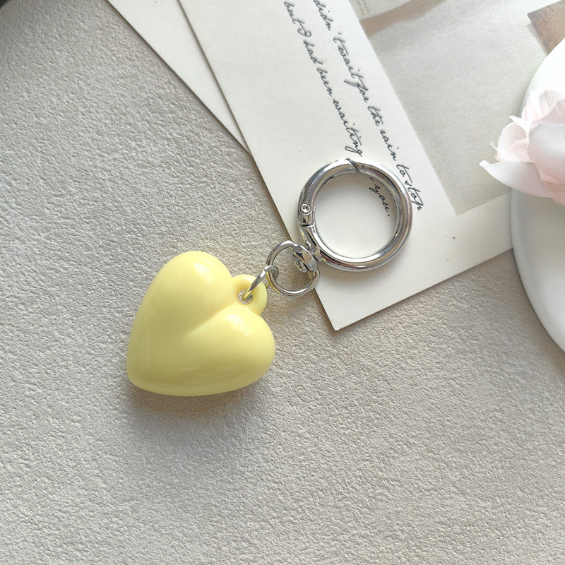 Heart Shape Keychain Made Of Durable Plastic In Classic Black, Perfect For Everyday Use And Gift Giving