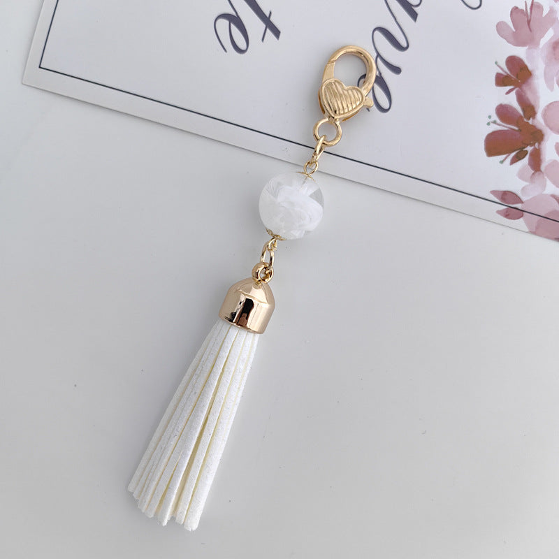 Tassel Bag Pendant In White Featuring PU Leather Material, Stylish Keychain Accessory
