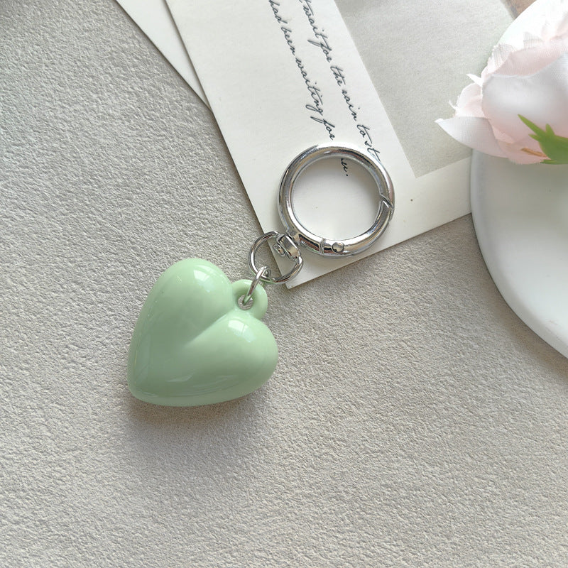 Heart Shape Keychain Made Of Durable Plastic In Classic Black, Perfect For Everyday Use And Gift Giving