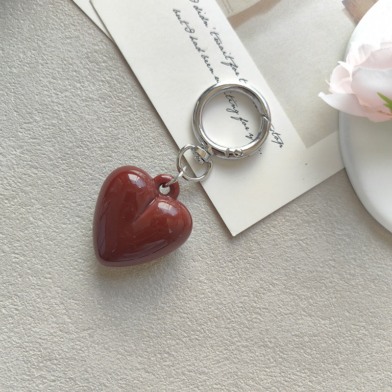 Heart Shape Keychain Made Of Durable Plastic In Classic Black, Perfect For Everyday Use And Gift Giving