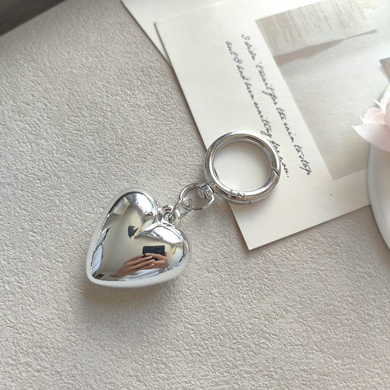 Heart Shape Keychain Made Of Durable Plastic In Classic Black, Perfect For Everyday Use And Gift Giving