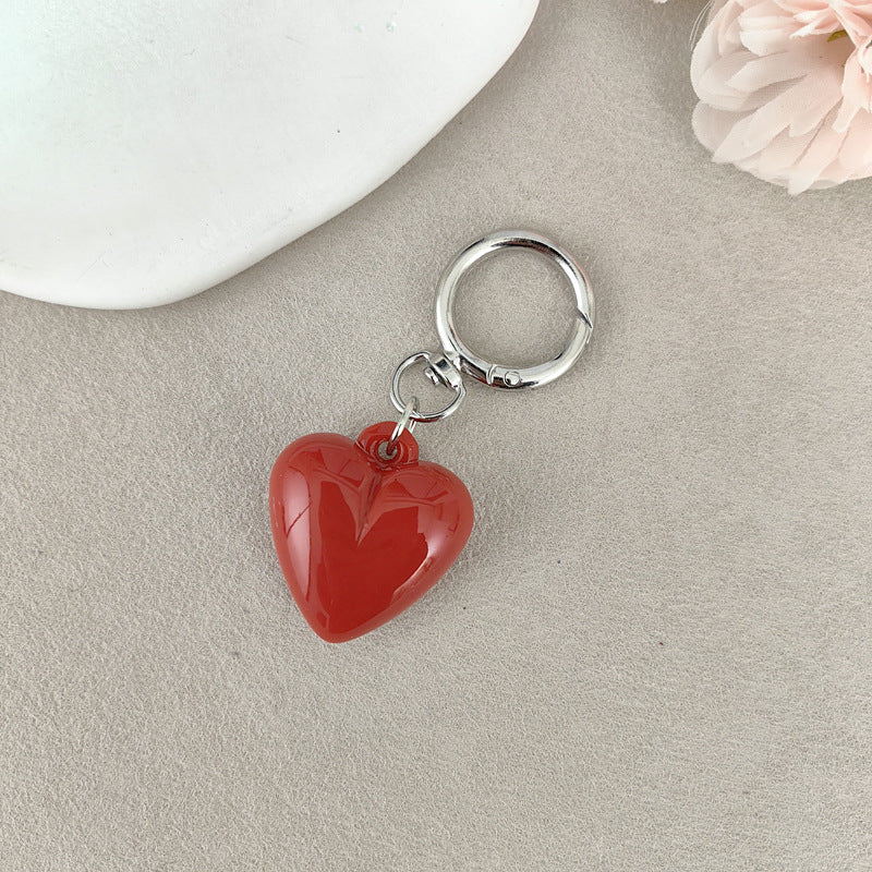 Heart Shape Keychain Made Of Durable Plastic In Classic Black, Perfect For Everyday Use And Gift Giving