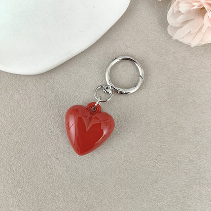 Heart Shape Keychain Made Of Durable Plastic In Classic Black, Perfect For Everyday Use And Gift Giving