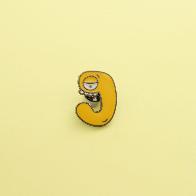 Letter Pin Brooch Featuring Cartoon Design In Durable Zinc Alloy Material