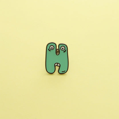 Letter Pin Brooch Featuring Cartoon Design In Durable Zinc Alloy Material