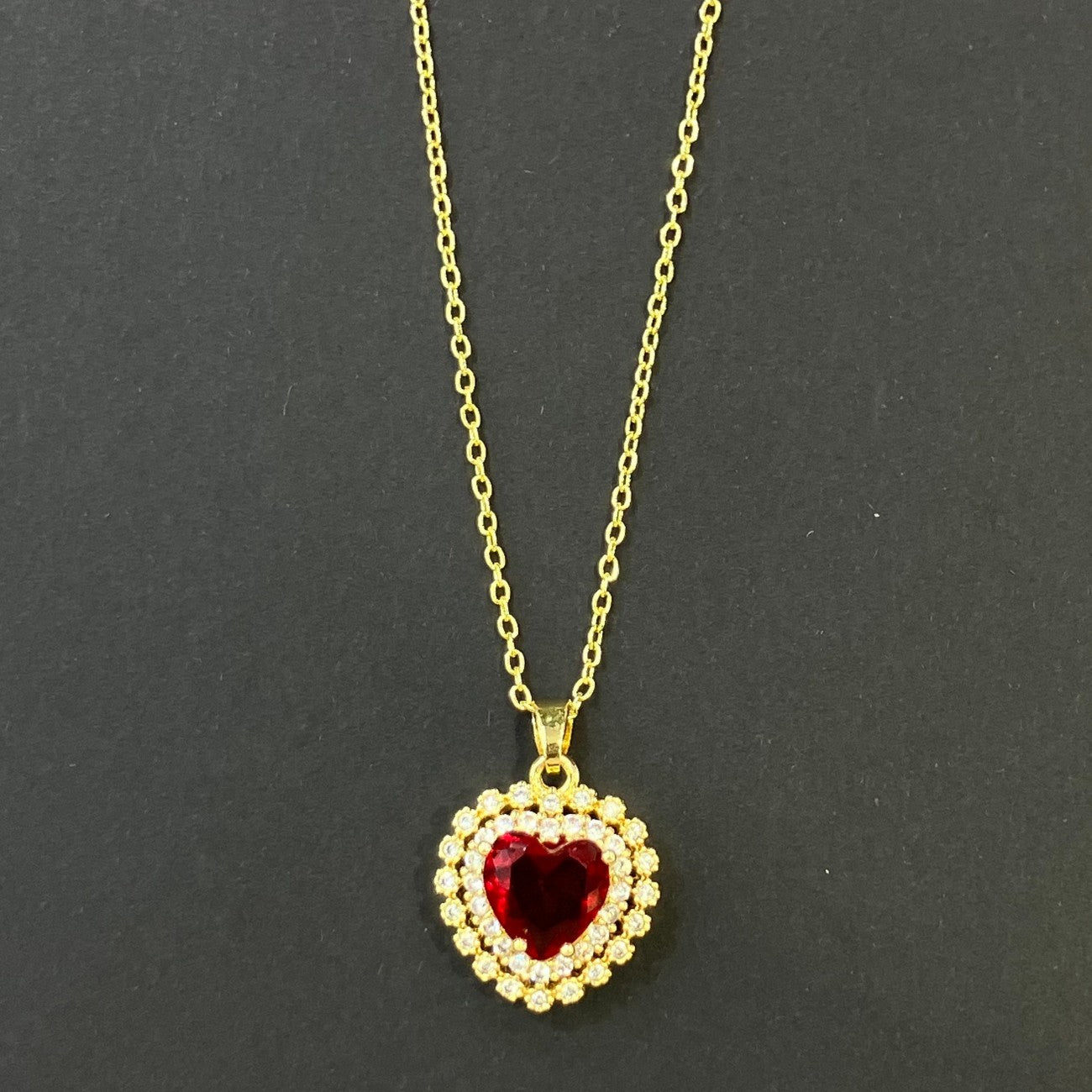 Heart Shape Necklace For Women In Golden Plated Copper With Artificial Crystal Inlay And Cable Chain
