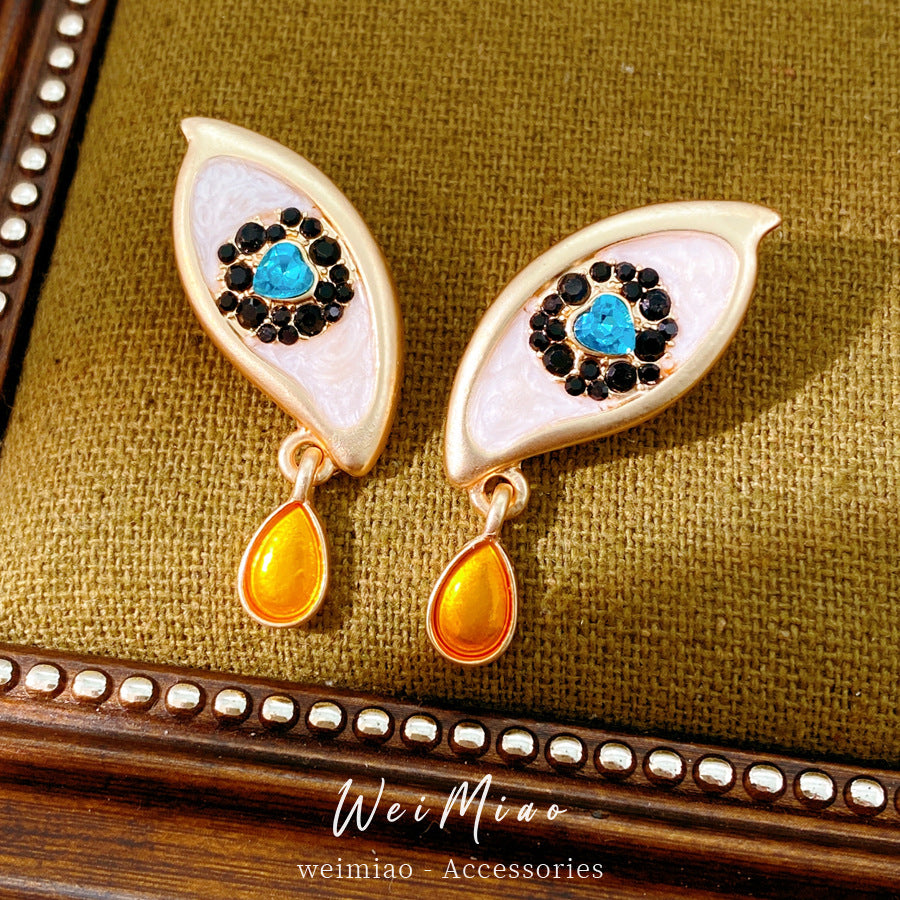 Retro Golden Enamel Alloy Stud Earrings For Women Featuring Eye Pattern