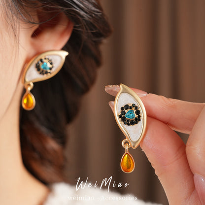 Retro Golden Enamel Alloy Stud Earrings For Women Featuring Eye Pattern
