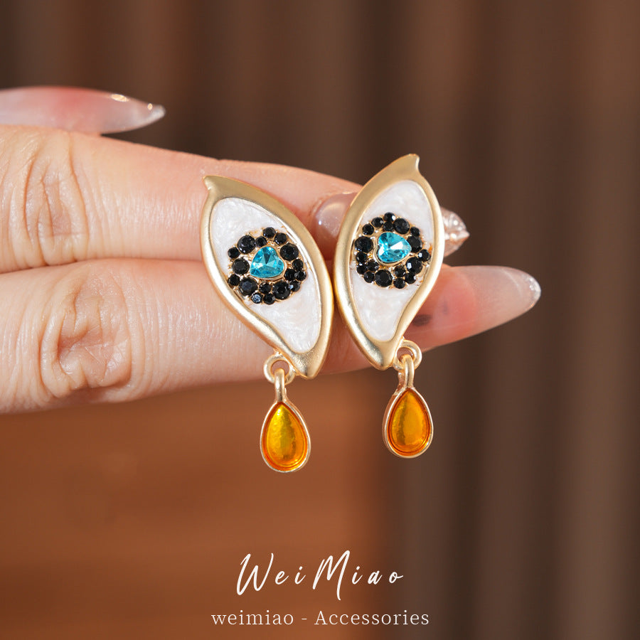 Retro Golden Enamel Alloy Stud Earrings For Women Featuring Eye Pattern