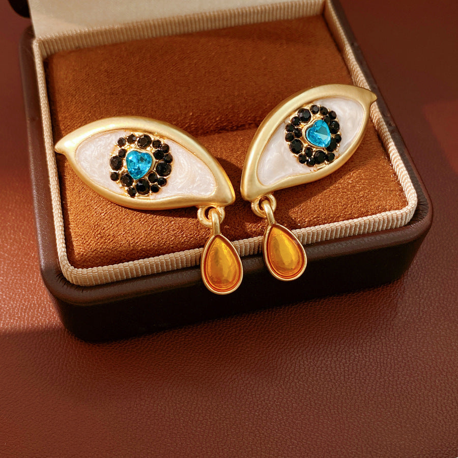 Retro Golden Enamel Alloy Stud Earrings For Women Featuring Eye Pattern