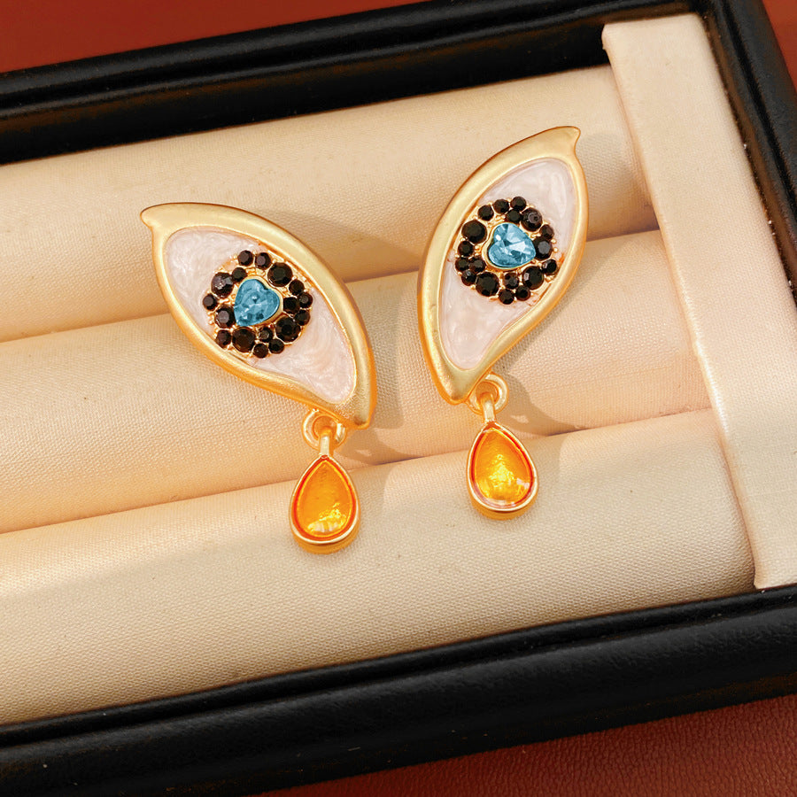 Retro Golden Enamel Alloy Stud Earrings For Women Featuring Eye Pattern