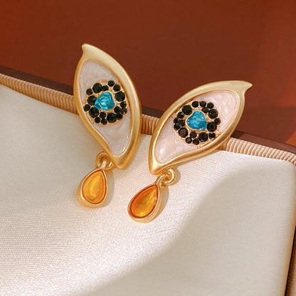 Retro Golden Enamel Alloy Stud Earrings For Women Featuring Eye Pattern