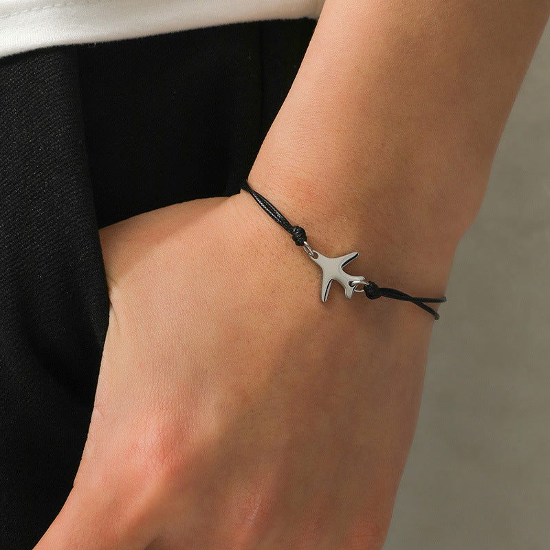 Black Airplane Bracelet Featuring Intricate Weave Craftsmanship