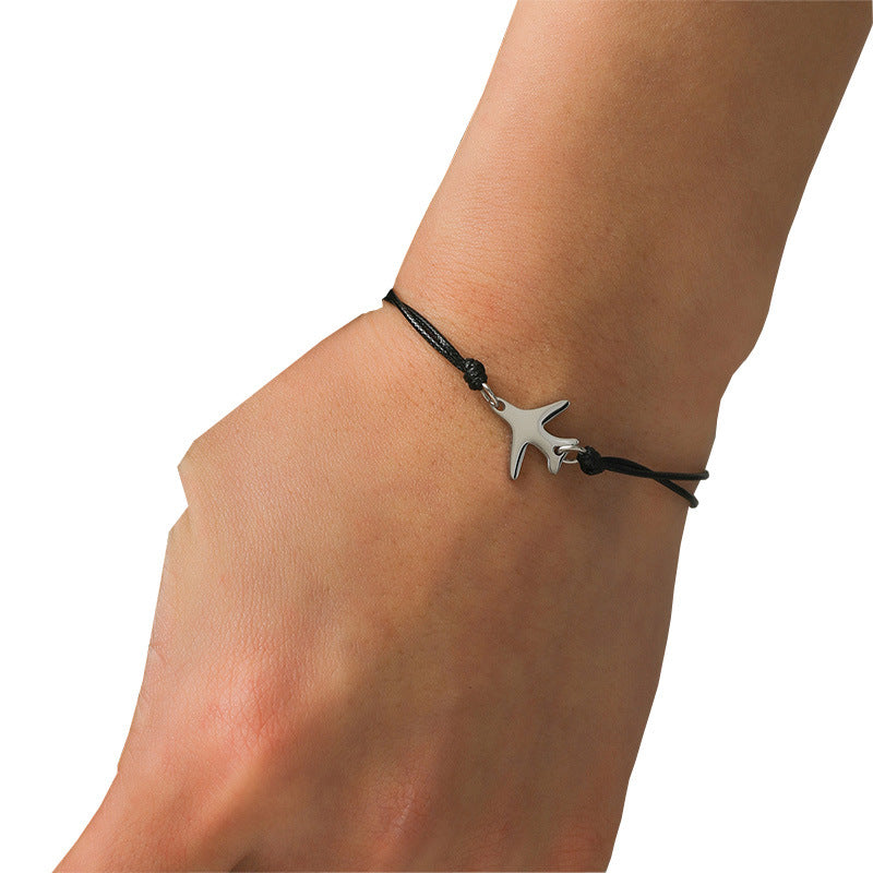Black Airplane Bracelet Featuring Intricate Weave Craftsmanship