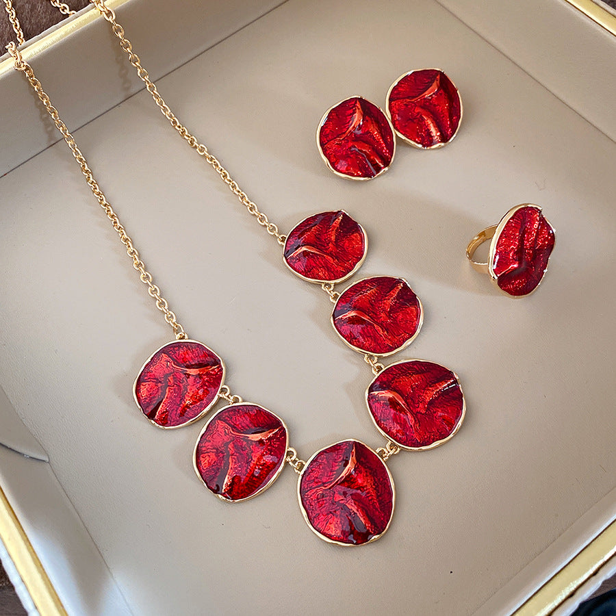 Retro Golden Jewelry Set Featuring Round Pattern, Alloy Material, And Enamel Craftsmanship