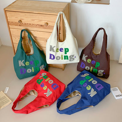 Square Canvas Shoulder Bag Featuring Letter Pattern, Stylish And Durable For Everyday Use