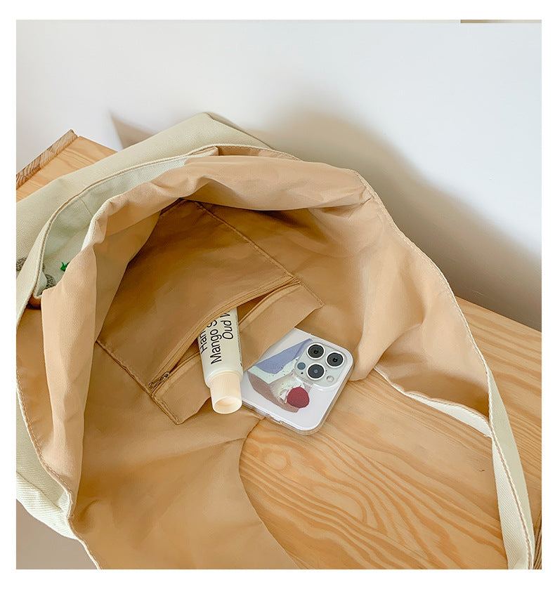 Square Canvas Shoulder Bag Featuring Letter Pattern, Stylish And Durable For Everyday Use