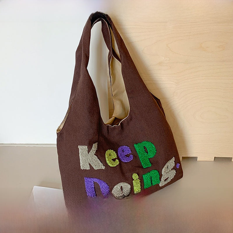 Square Canvas Shoulder Bag Featuring Letter Pattern, Stylish And Durable For Everyday Use