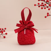 Burgundy Embossed Flower Hand Brand