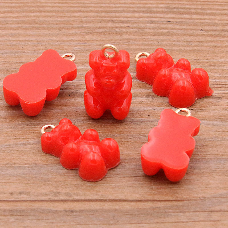 Golden Bear Pattern Plastic Jewelry Accessory Featuring A Charming Design