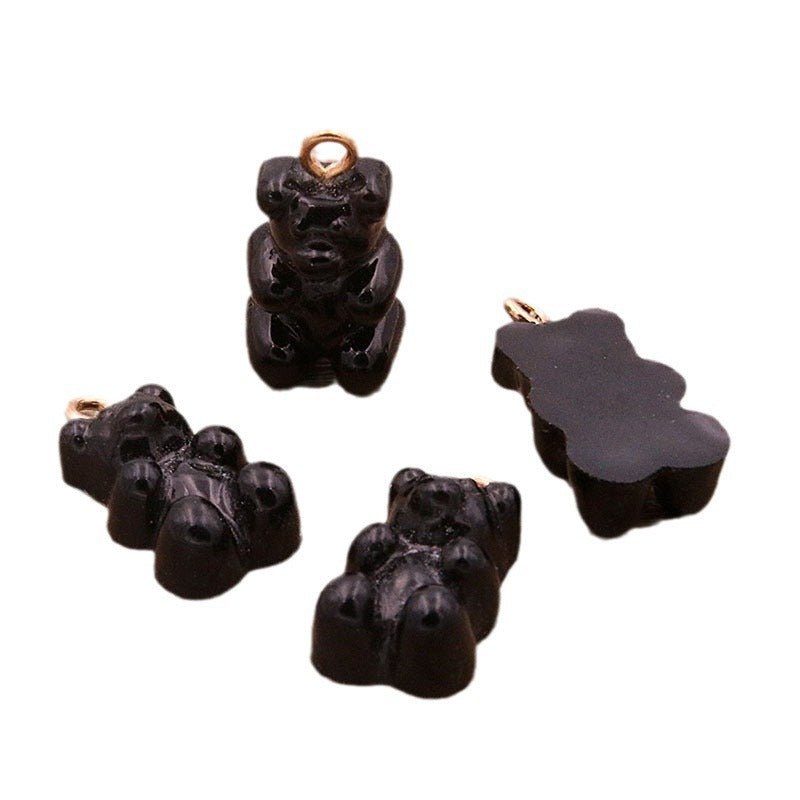 Golden Bear Pattern Plastic Jewelry Accessory Featuring A Charming Design