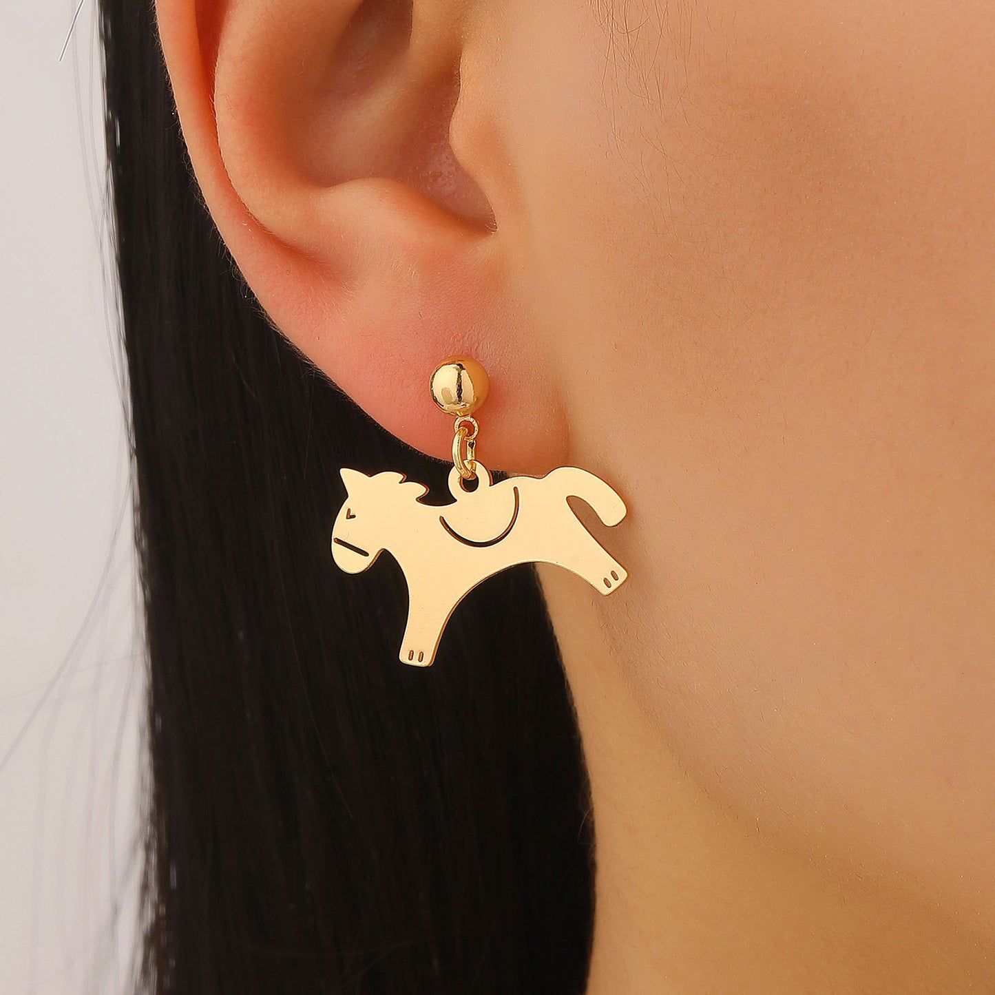 Horse Stud Earrings For Women In Golden Copper Featuring Elegant Design