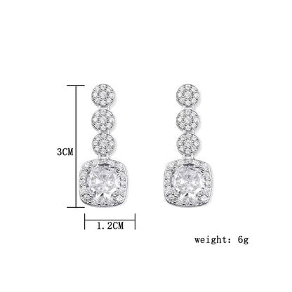 Geometric Stud Earrings For Women In Electroplated Copper With Zircon Inlay Featuring Electroplated Gold Plating