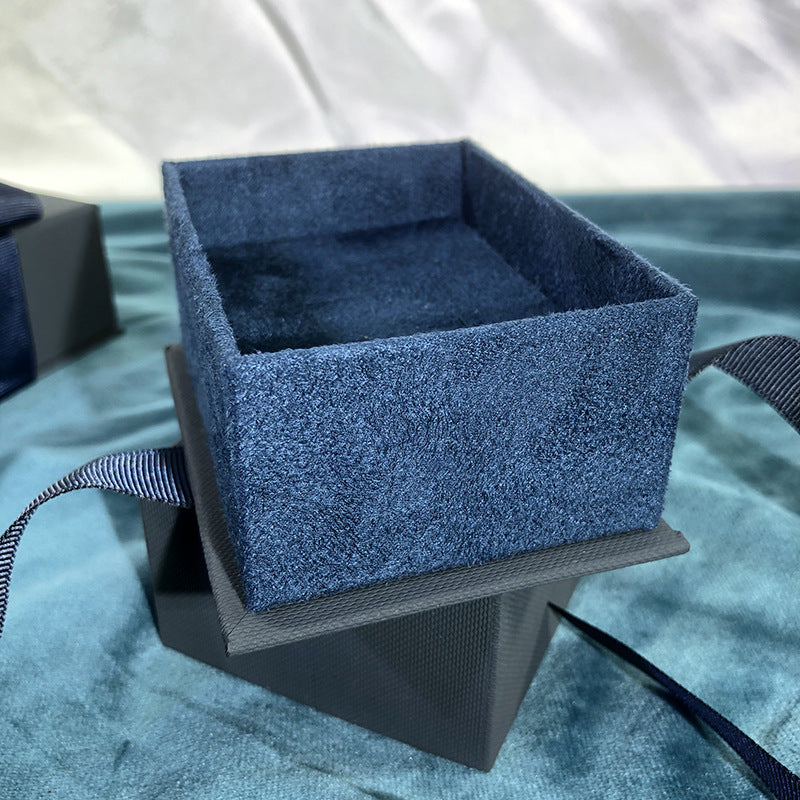 Paper Jewelry Box With Bow Tie Design In Dark Blue, Featuring Love Charms For Elegant Jewelry Packaging