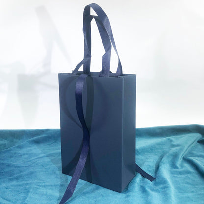 Paper Jewelry Box With Bow Tie Design In Dark Blue, Featuring Love Charms For Elegant Jewelry Packaging