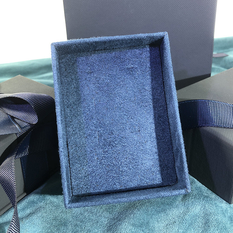 Paper Jewelry Box With Bow Tie Design In Dark Blue, Featuring Love Charms For Elegant Jewelry Packaging