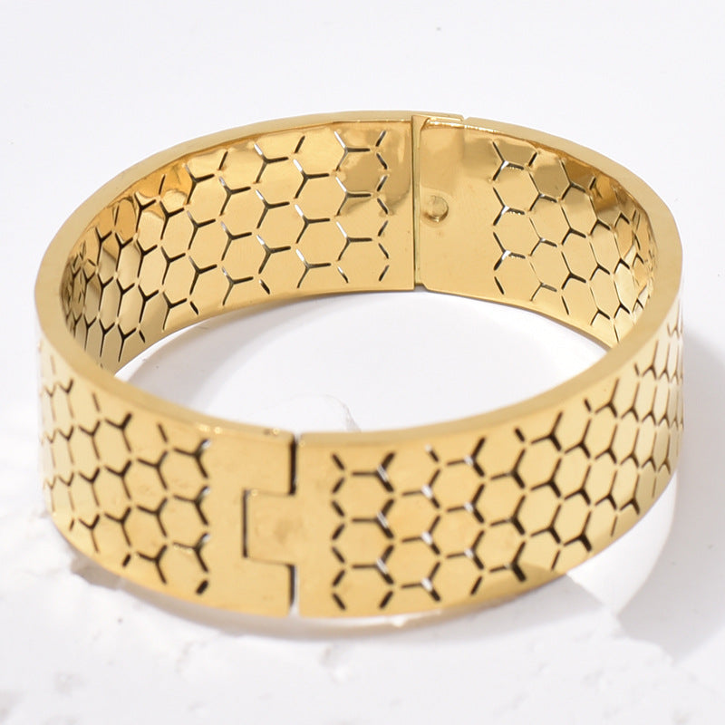 Wide Bracelet For Bangle Made Of Titanium Steel Featuring A Golden Finish