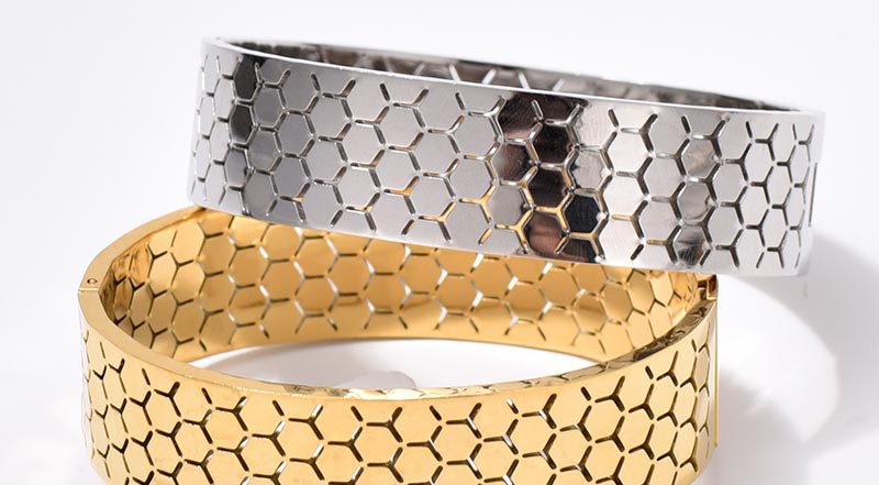 Wide Bracelet For Bangle Made Of Titanium Steel Featuring A Golden Finish
