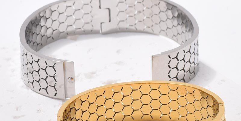 Wide Bracelet For Bangle Made Of Titanium Steel Featuring A Golden Finish