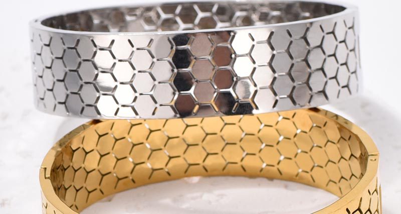 Wide Bracelet For Bangle Made Of Titanium Steel Featuring A Golden Finish