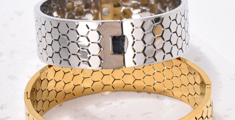 Wide Bracelet For Bangle Made Of Titanium Steel Featuring A Golden Finish