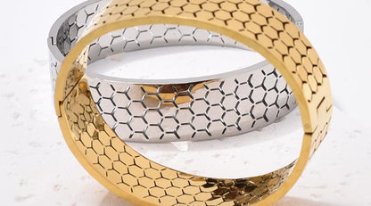 Wide Bracelet For Bangle Made Of Titanium Steel Featuring A Golden Finish