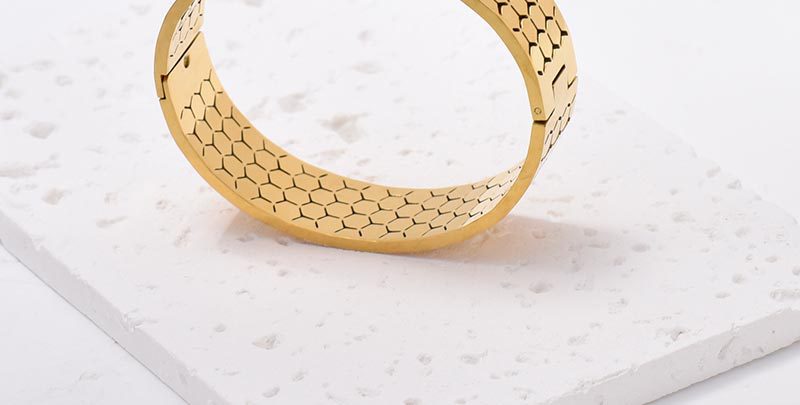 Wide Bracelet For Bangle Made Of Titanium Steel Featuring A Golden Finish
