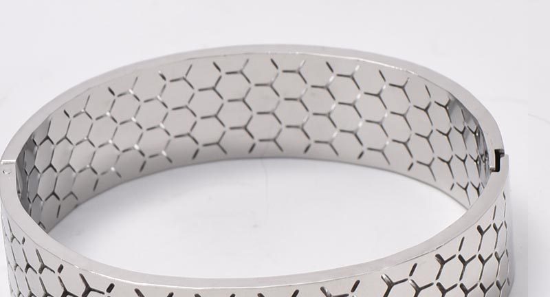 Wide Bracelet For Bangle Made Of Titanium Steel Featuring A Golden Finish